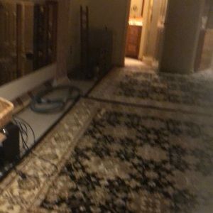 Two brown wooden chairs